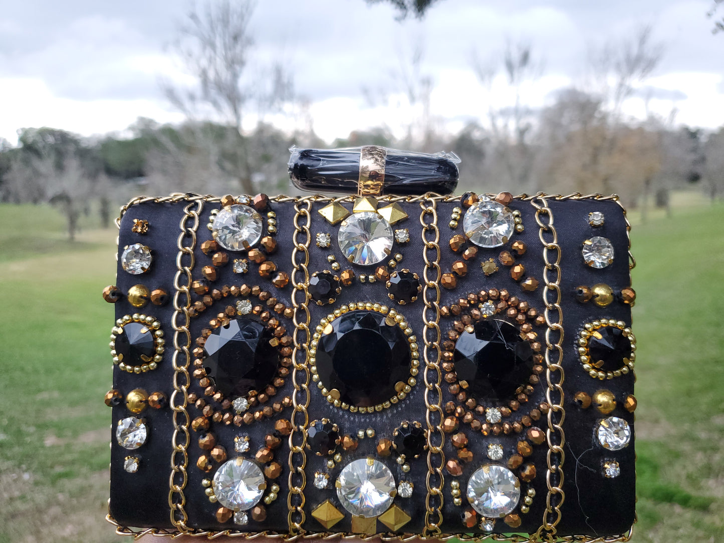 Rhinestone inspired metal clutch
